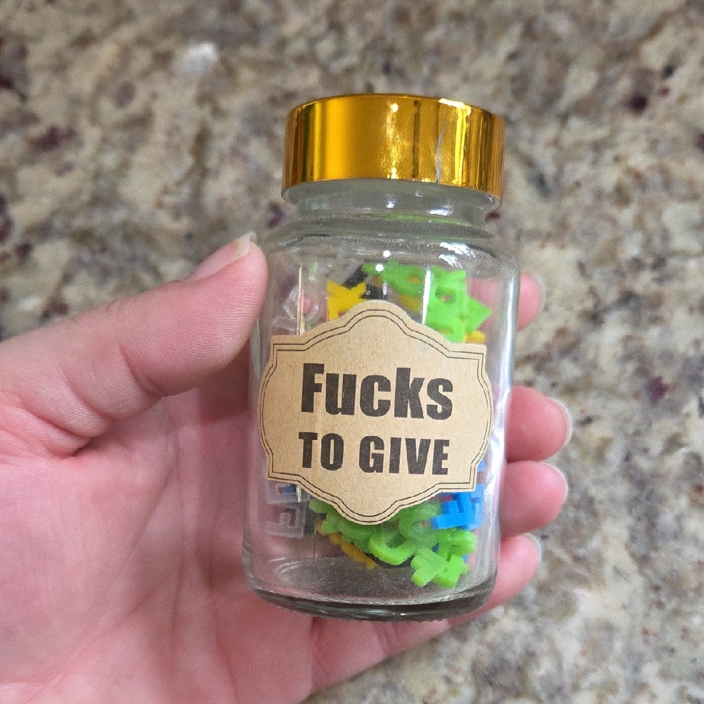 Glass Jar with Gold Lid "Fucks To Give" Label